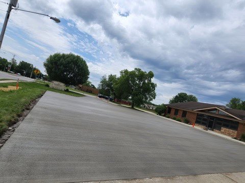 commercial concrete contractor in Grabill. view of a freshly poured concrete parking lot