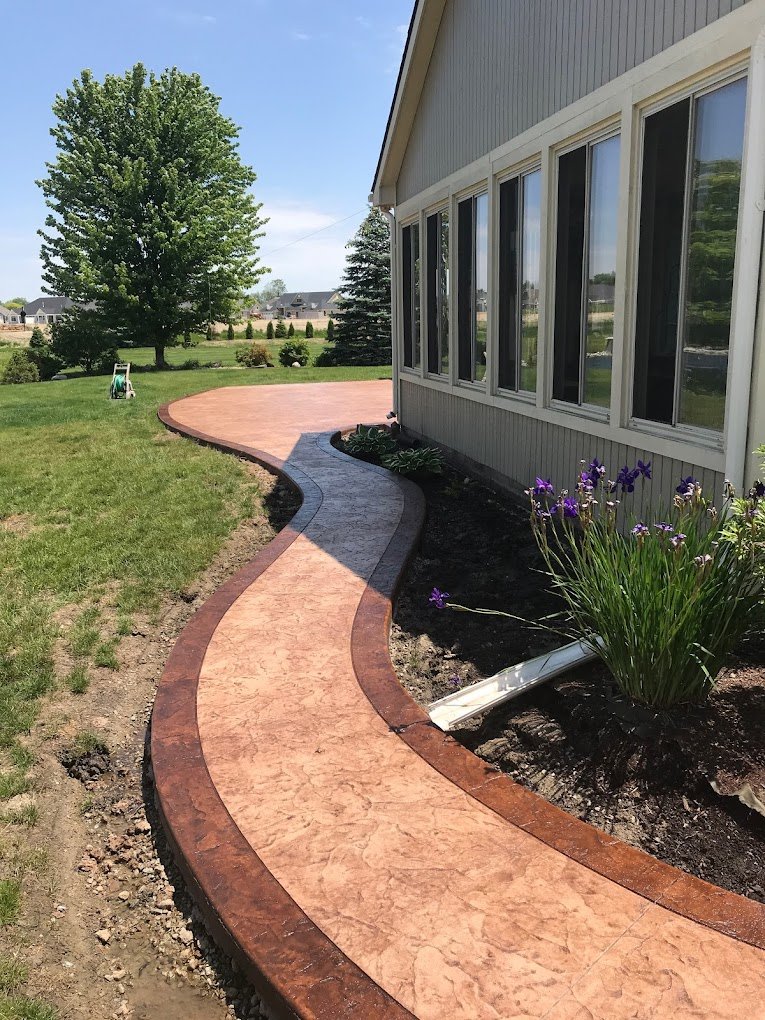 Concrete walkway done by Crystal Creek - The best concrete contractor in Angola. Stamped concrete in Waterloo