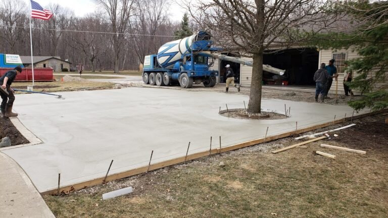 Crystal Creek Team pouring fresh concrete with a truck.