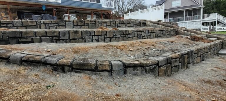 Landscape curbing in Fort Wayne to retain a flower bed