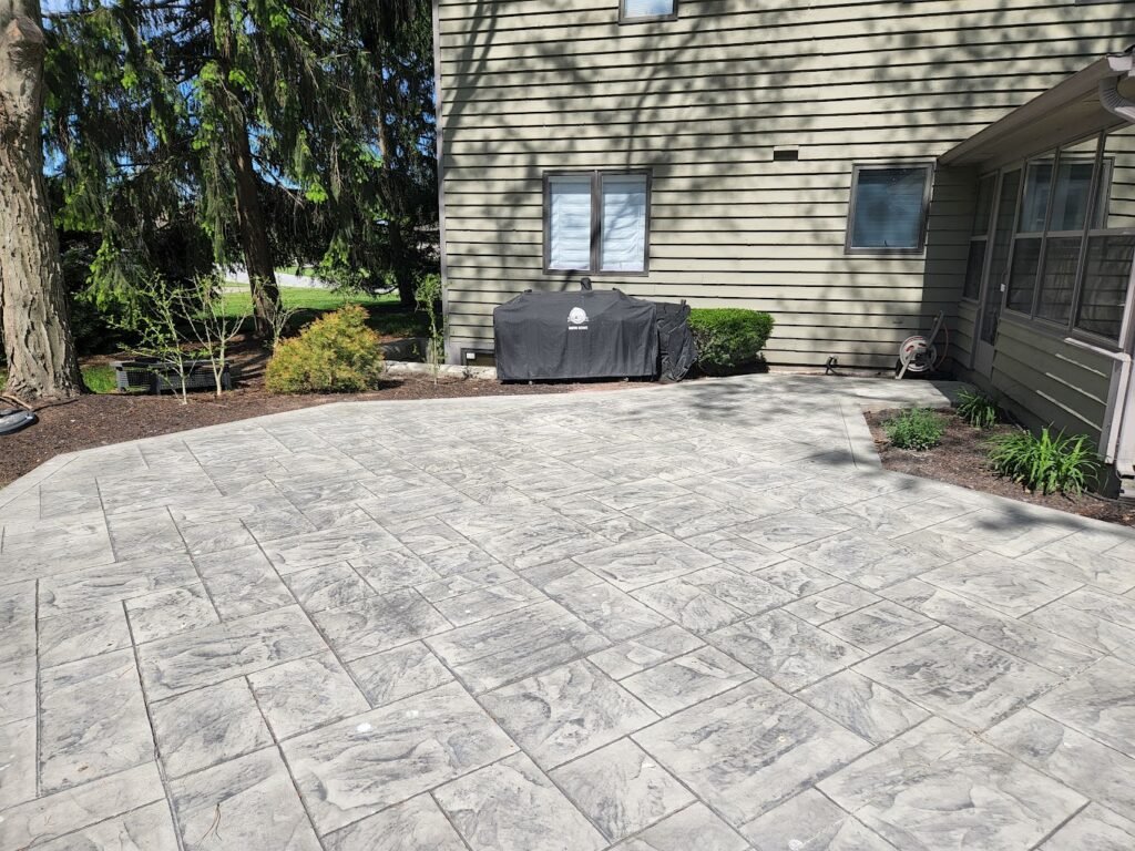 Stamped Patio done by the best concrete contractor in New Paris, Crystal Creek. Concrete patios in Leo-Cedarville