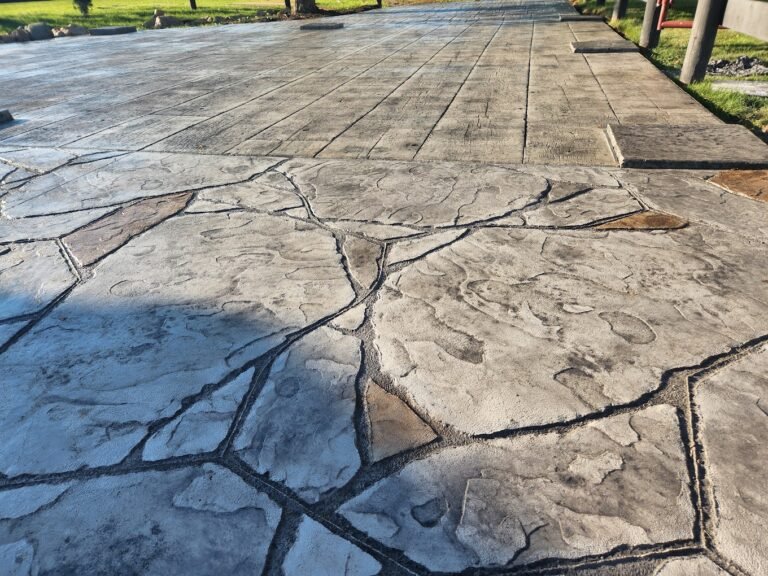 Patio stamped in decorative stone. Showing Crystal Creek - the best concrete contractor in Pierceton, IN.