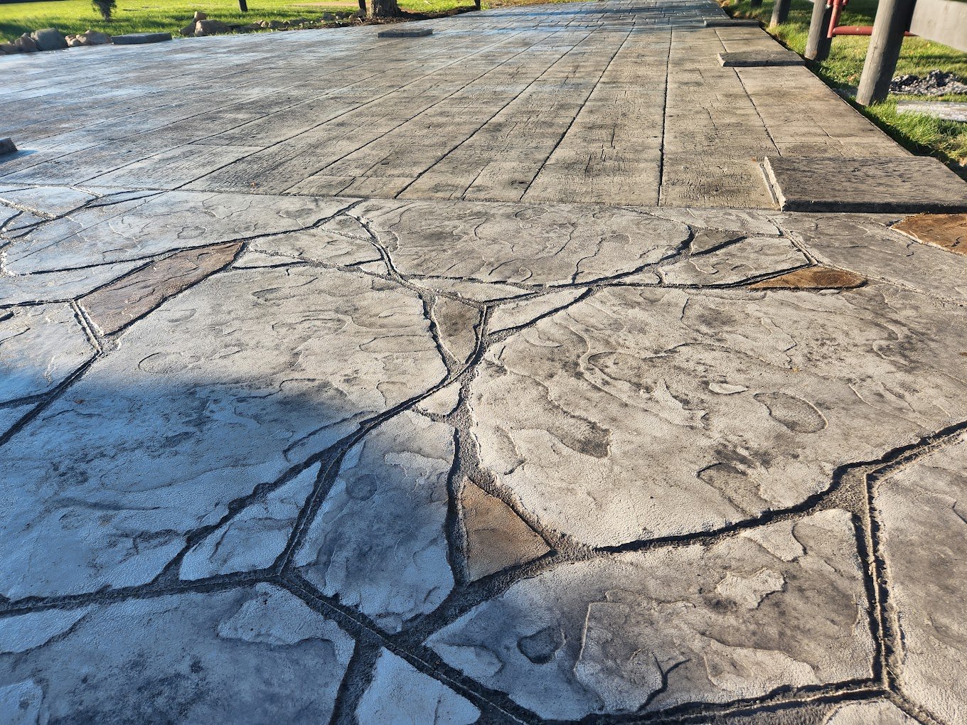 Patio stamped in decorative stone. Showing Crystal Creek - the best concrete contractor in Pierceton, IN. Stamped concrete in woodburn. Commercial concrete contractor in Butler