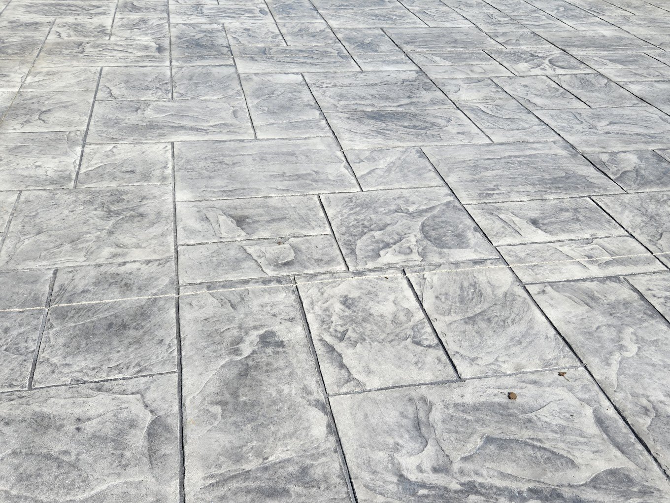 Grey stone stamp - showing off Crystal Creek's concrete stamping in Fort Wayne. Stamped concrete in Butler