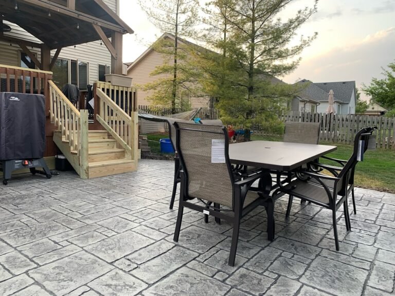 Stamped patio with chairs in it. The best concrete contractor in LaGrange, IN