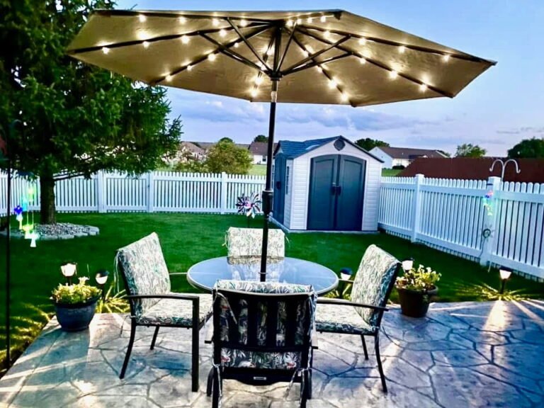 shot of a concrete patio with outdoor furniture on top