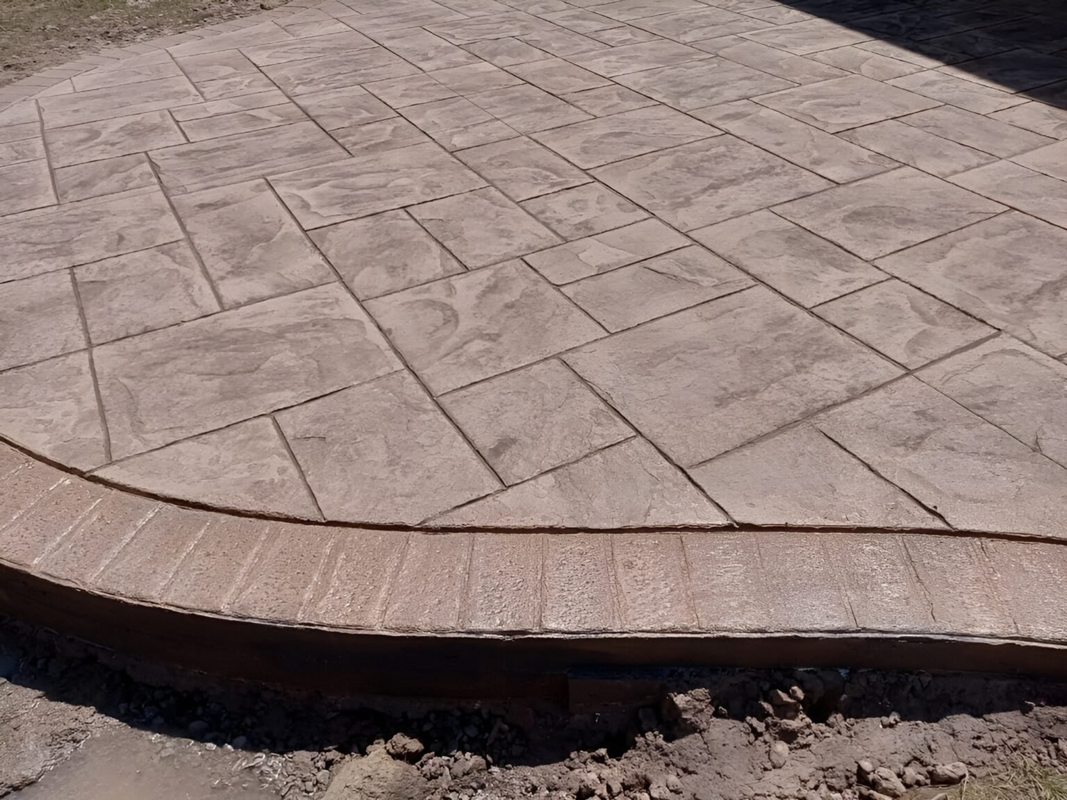 Stamped concrete in a red color