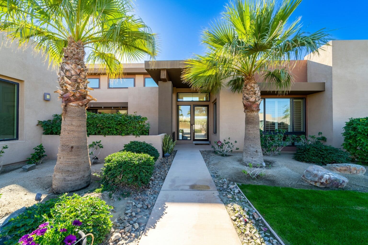 Concrete-finished home entryway, installed by qualified and experienced experts