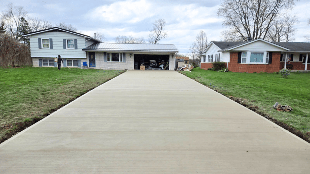 Concrete driveway approach and curb cut under construction on a Fort Wayne residential street