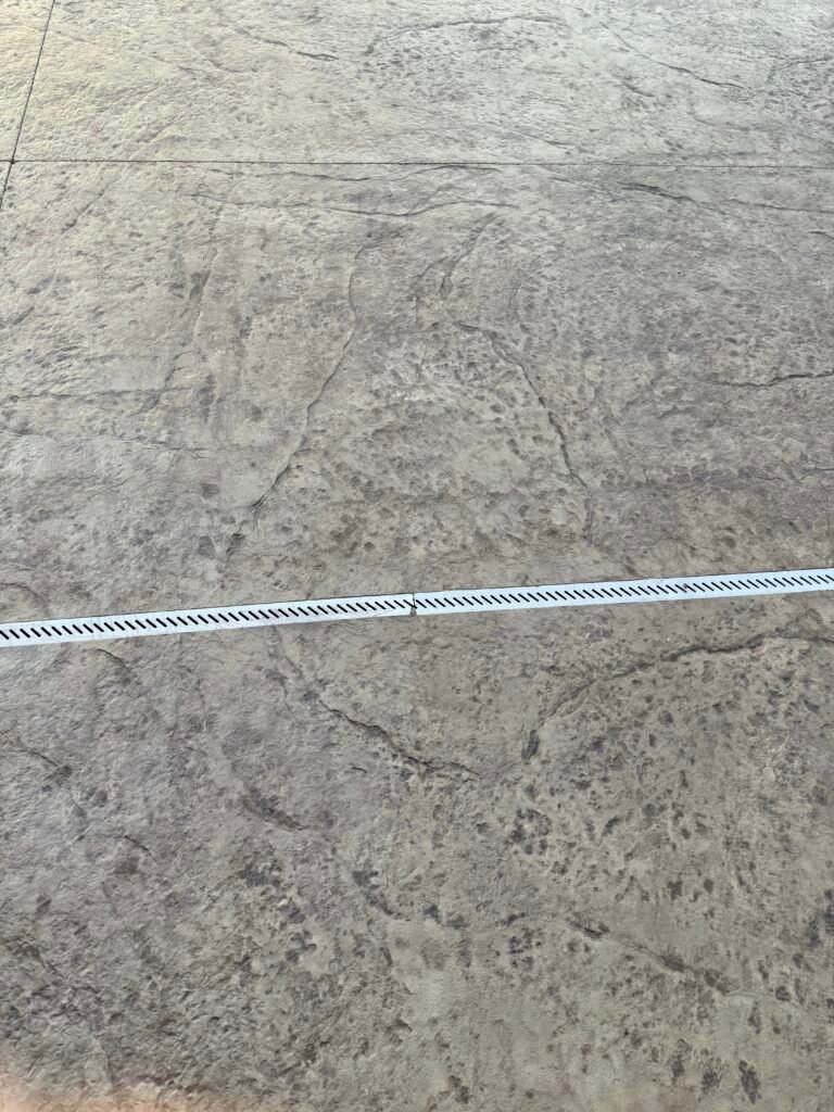 Stamped concrete with drainage
